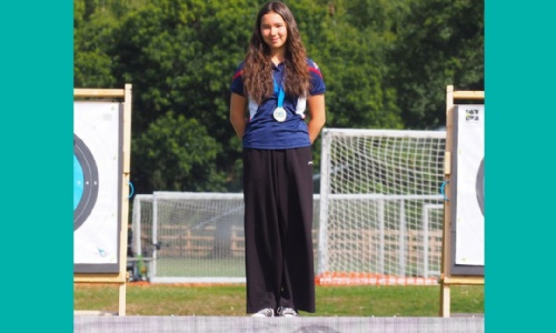 Eva wins gold medal in archery competition